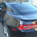 Photographs of a 2014 Chevrolet Camaro that was in an accident and repaired by Elite Paint & Body Shop in West Palm Beach Florida